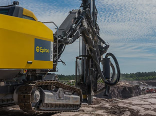 Quarry blast hole drilling with matched DTH tools